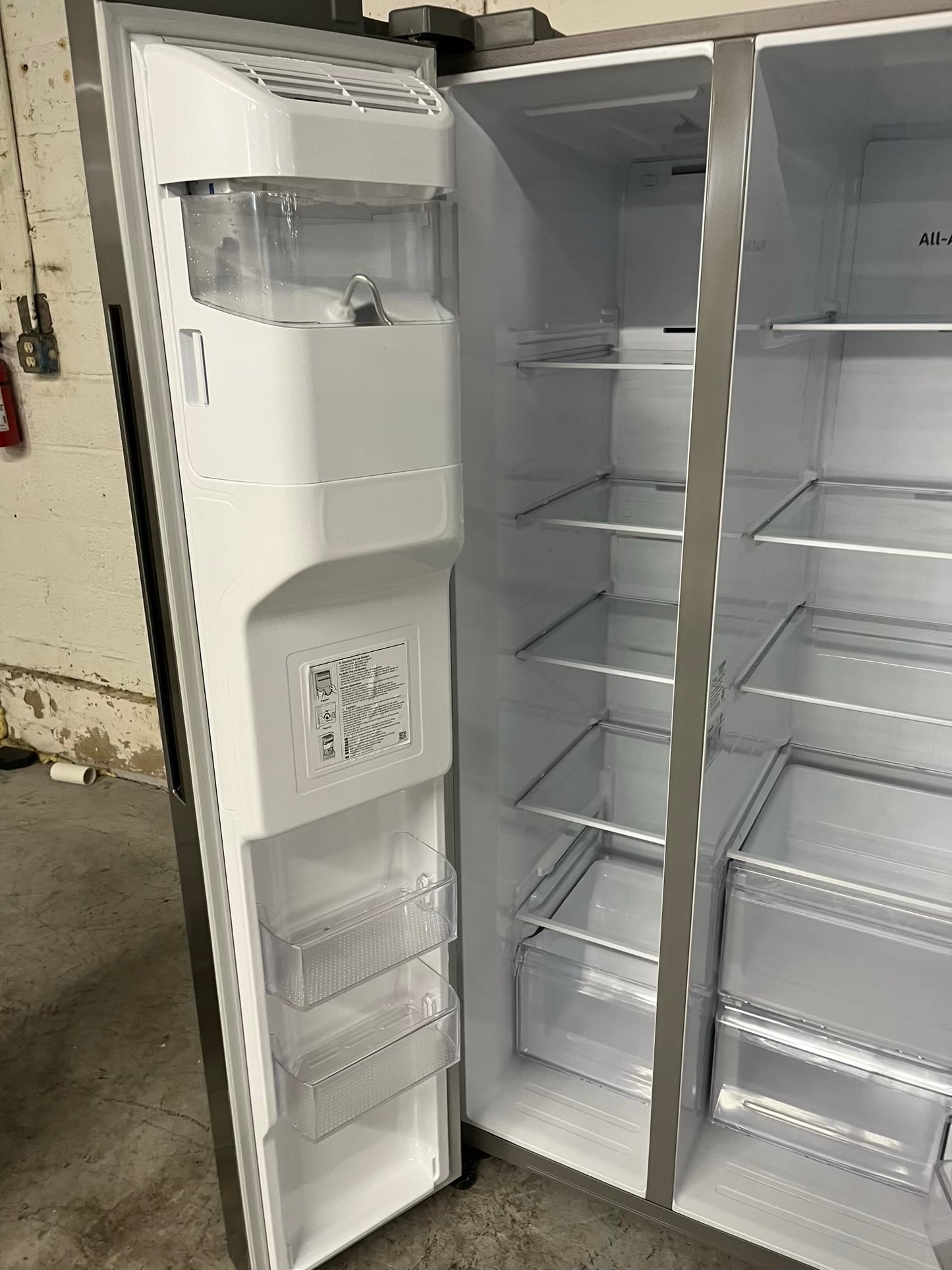 Used Refurbished Samsung side x side refrigerator stainless steel w/ice water dispenser 36" #RF835UB-TR