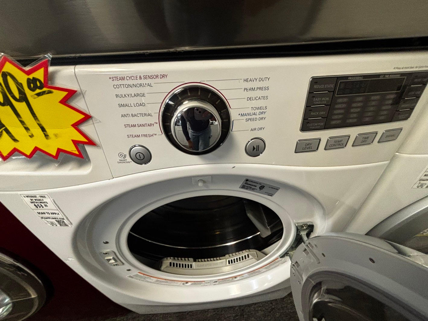 - used -refurbished LG 7.4cu.ft.steam sensor Dry 10 cicles 5 temperature settings -front load stackable or side by side electric 220v dryer in white 27" #EDL6688L