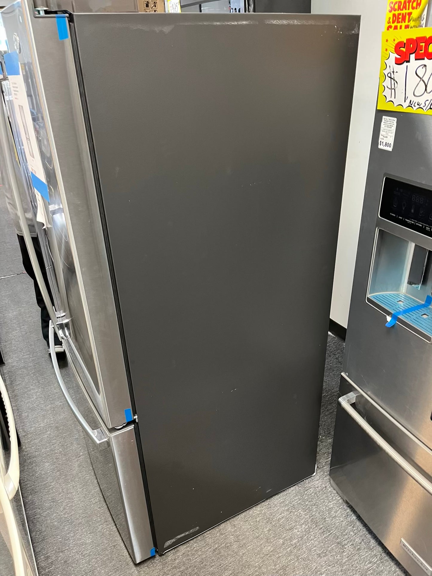Customer Return | Scratch & Dent GE French door refrigerator stainless steel w/ice & water dispenser inside 36" #RF492GL