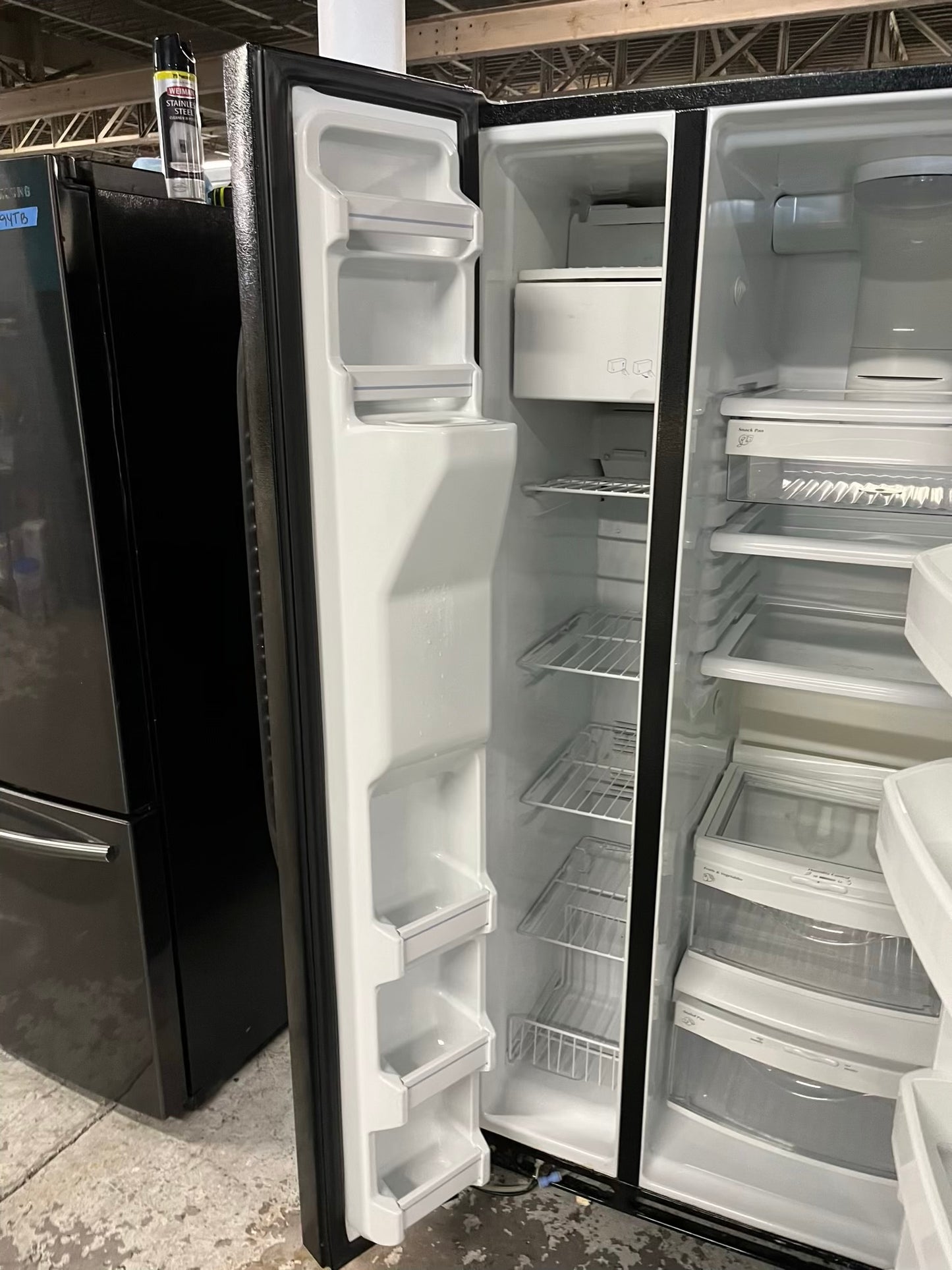 GE side x side refrigerator black w/ice water dispenser 33” #RF393VB