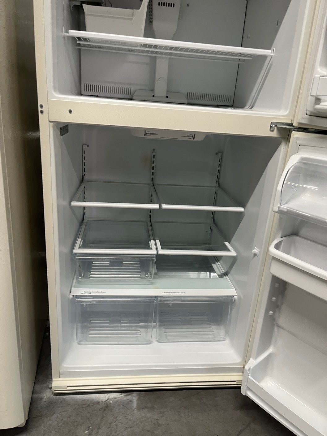 - Whirlpool 33” wide 21 Cu.Ft w/Iced Maker Top freezer refrigerator in bisque color 33" #RF21CT2B Refurbished
