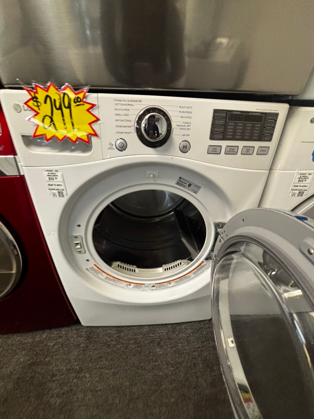 - used -refurbished LG 7.4cu.ft.steam sensor Dry 10 cicles 5 temperature settings -front load stackable or side by side electric 220v dryer in white 27" #EDL6688L