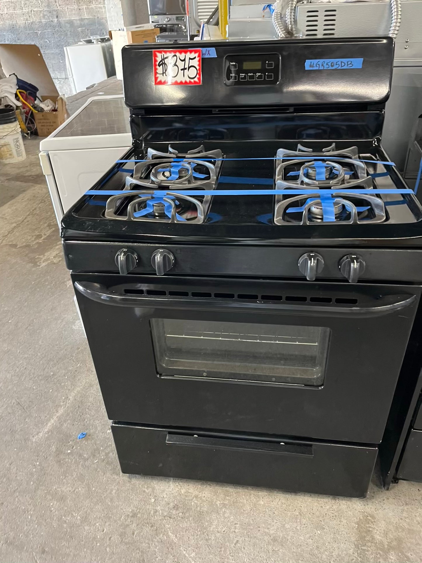 - Frigidaire GAS range black 4 burner bake broil self clean 30” item number #GR505DB