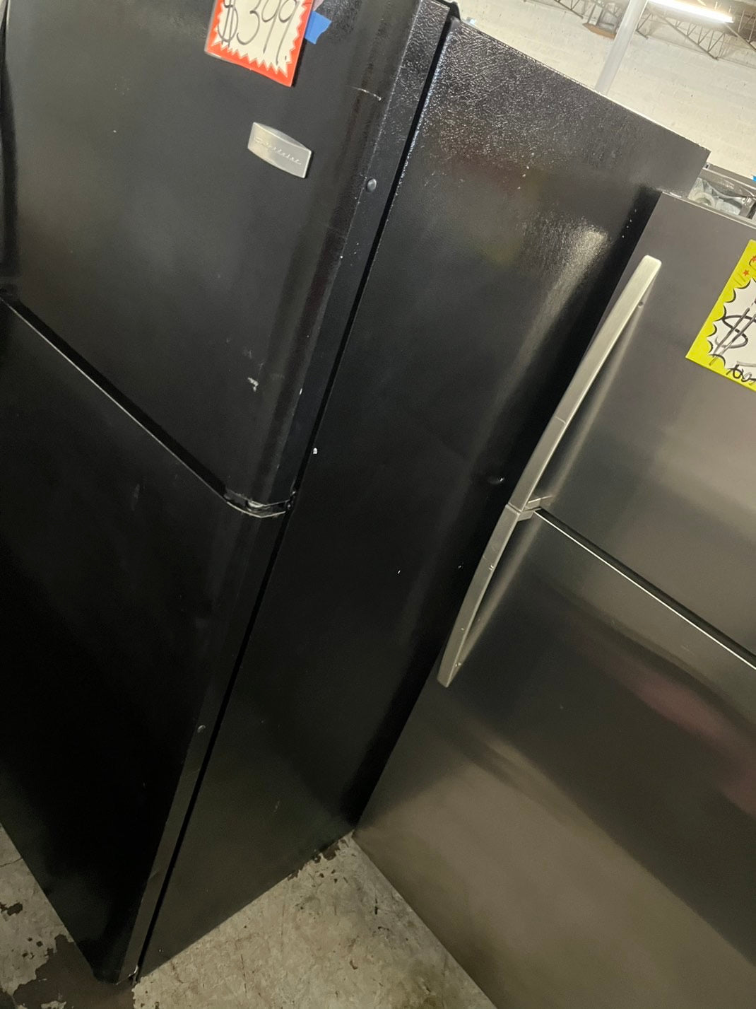 =Frigidaire 21cu.ft -top freezer refrigerator black used refurbished 30” #RFF56B