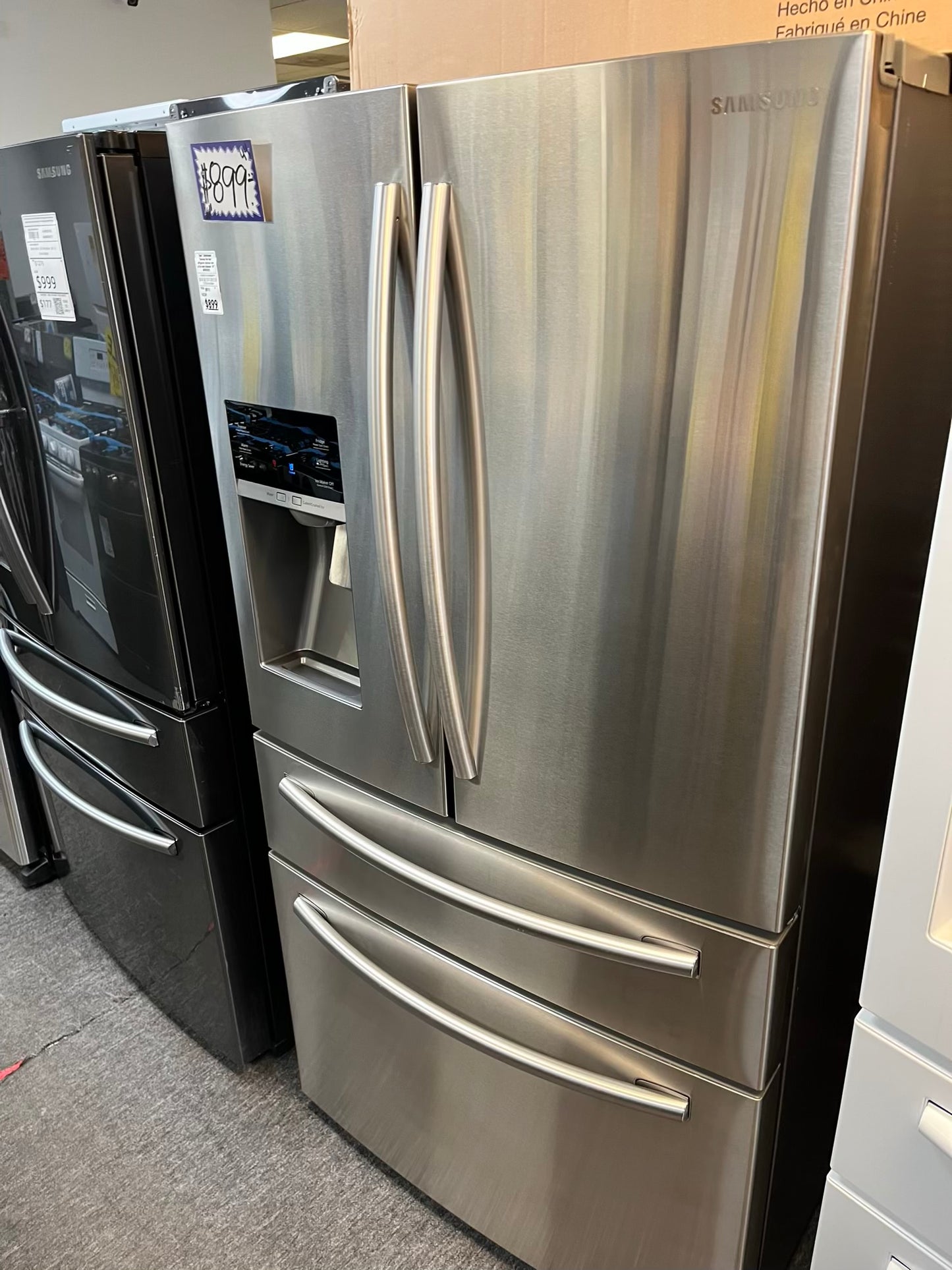 Used | Refurbished Samsung four door refrigerator stainless steel w/ice water dispenser 36" #RF502YL