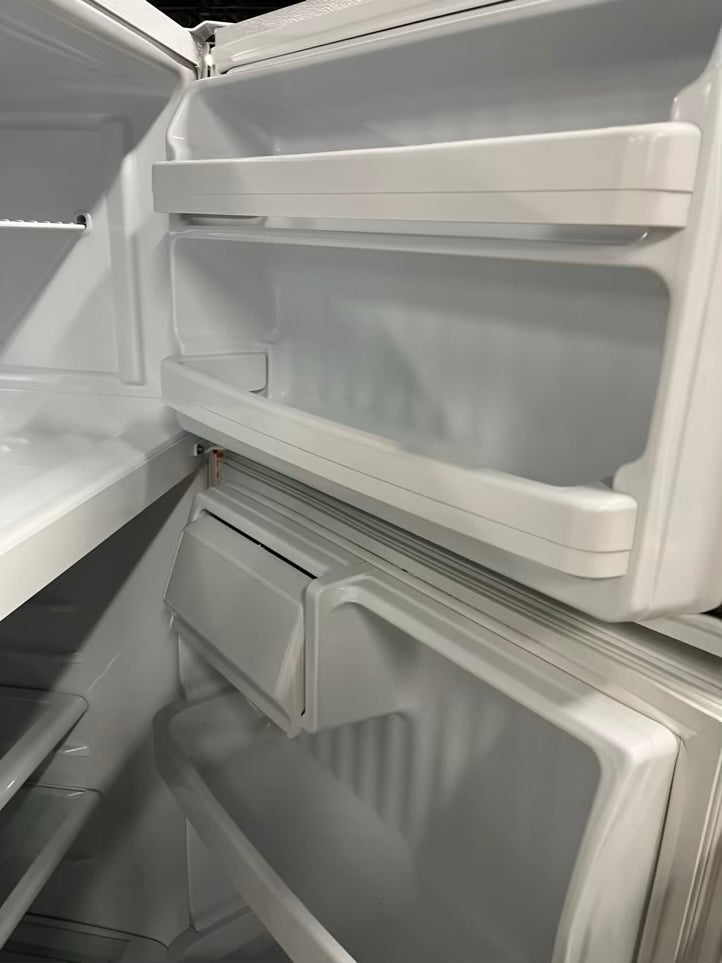 - GE Top freezer Refrigerator white | Item number #RF667C 28” in Refurbished
