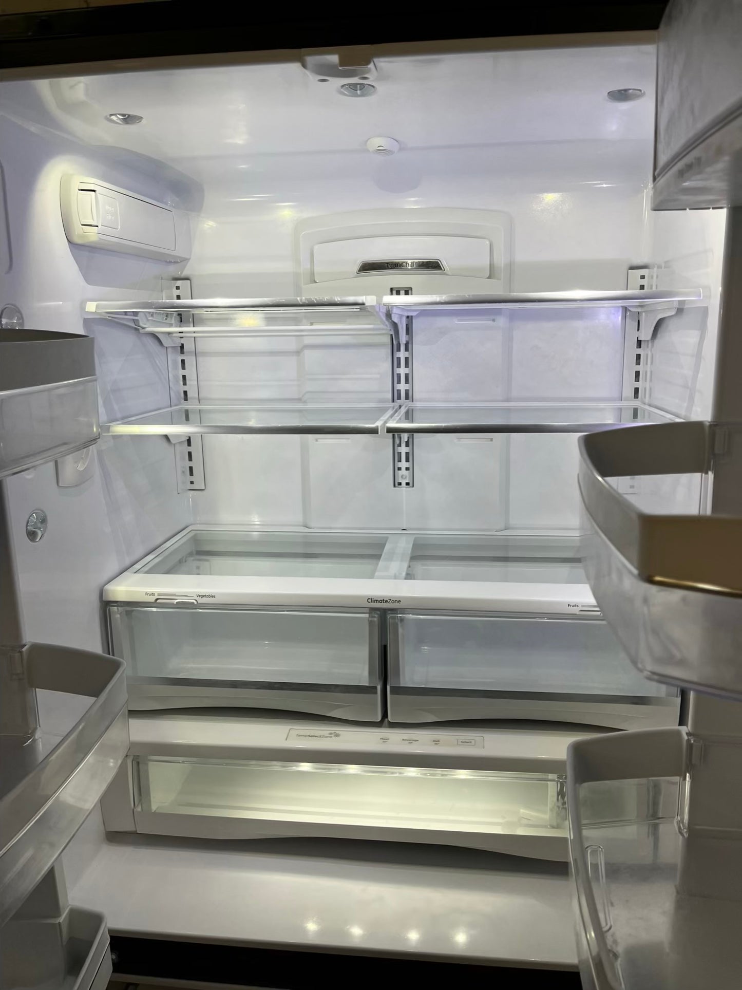 GE French door Refrigerator counter depth stainless steel w/water dispenser  & ice maker inside Item number #RF734VB 36” in Refurbished