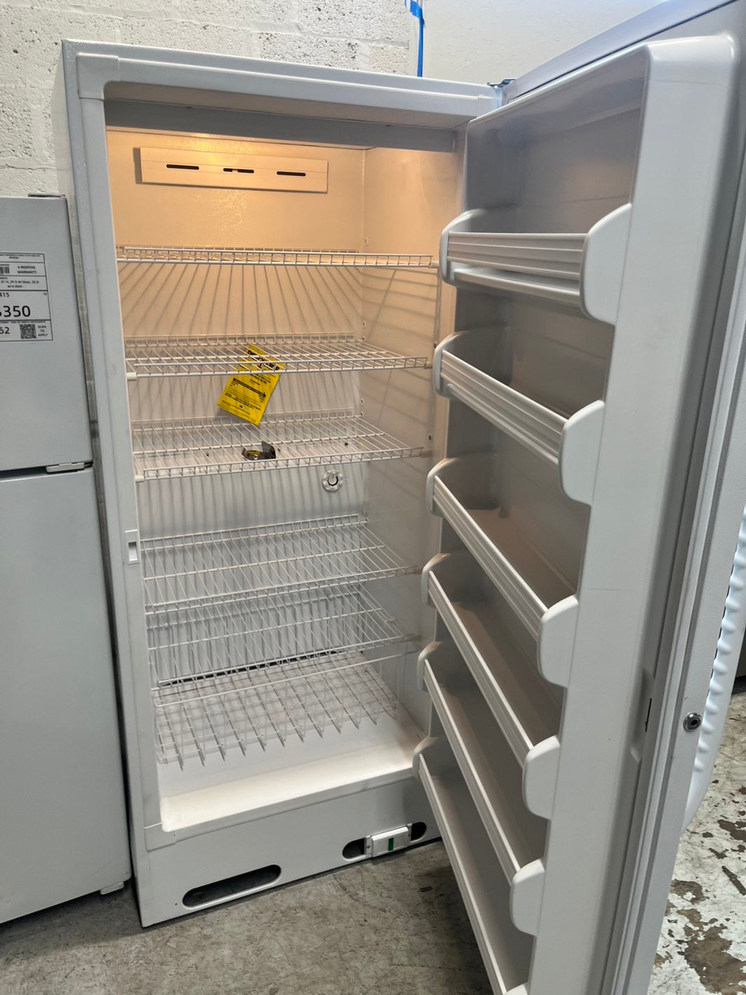 Ge 20 cu.ft up-right freezer white 32" #RF9001B-TR Refurbished