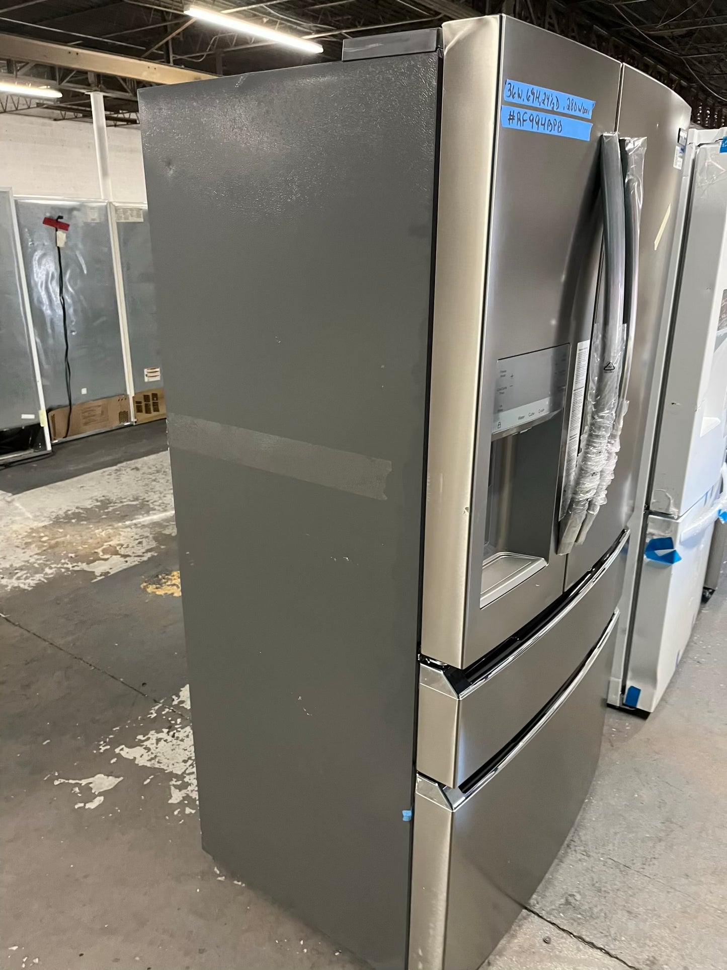 - Frigidaire Gallery four door refrigerator counter depth  stainless steel w/ice and water dispenser  used-refurbished 36”  #RF994BPB