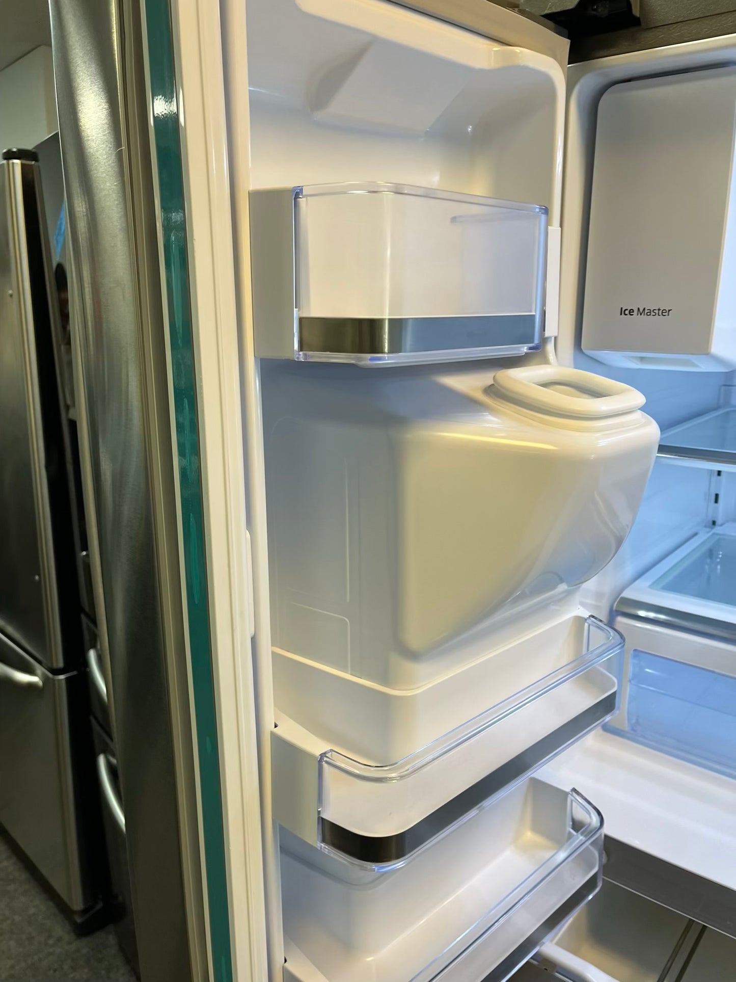 Used | Refurbished Samsung four door refrigerator stainless steel w/ice water dispenser 36" #RF502YL