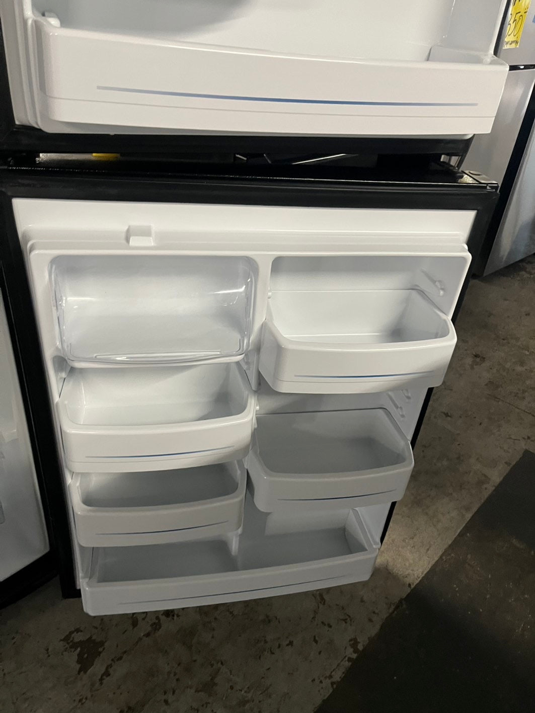 = Ge 33” Top freezer fridge  black refurbished #RFTB67B