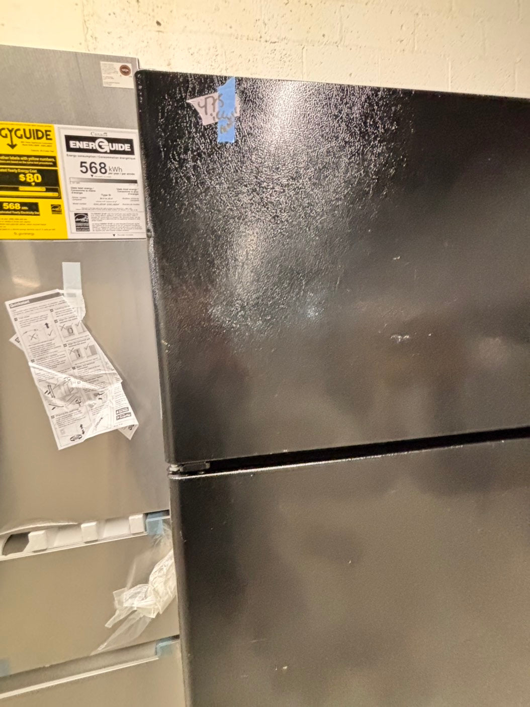 >GE  33” Top freezer fridge   With ice maker inside ,black  used-refurbished #RG21QB