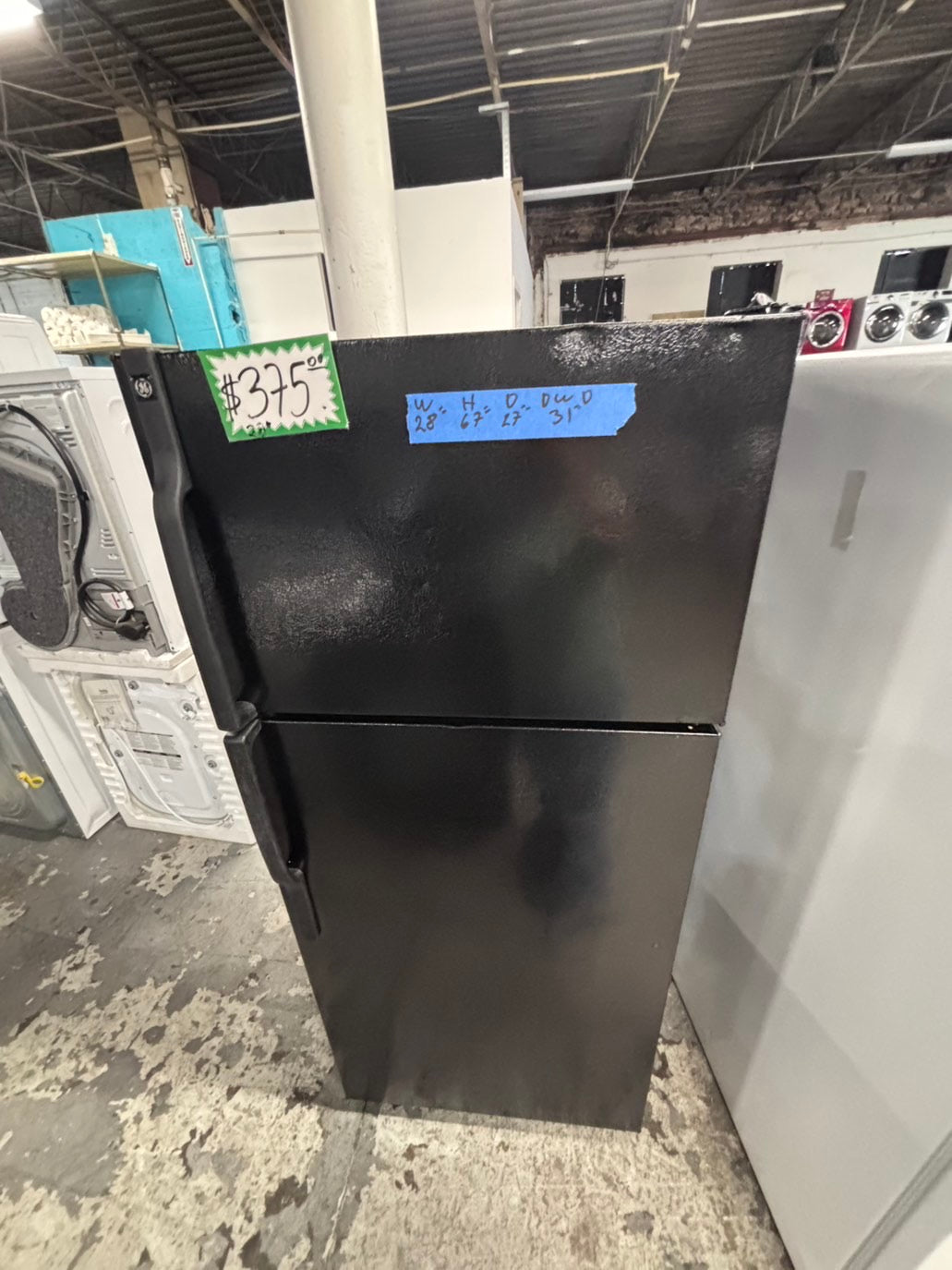 >*28” x 67”H GE  top freezer fridge black   used-refurbished #FGTR67WB