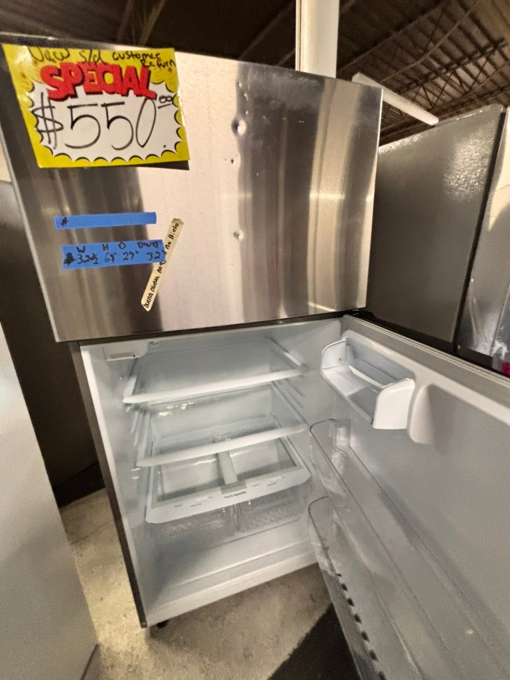 >new open box costumer return scratch & debt LG 33” Top freezer fridge, stainless #RLCF3C2B