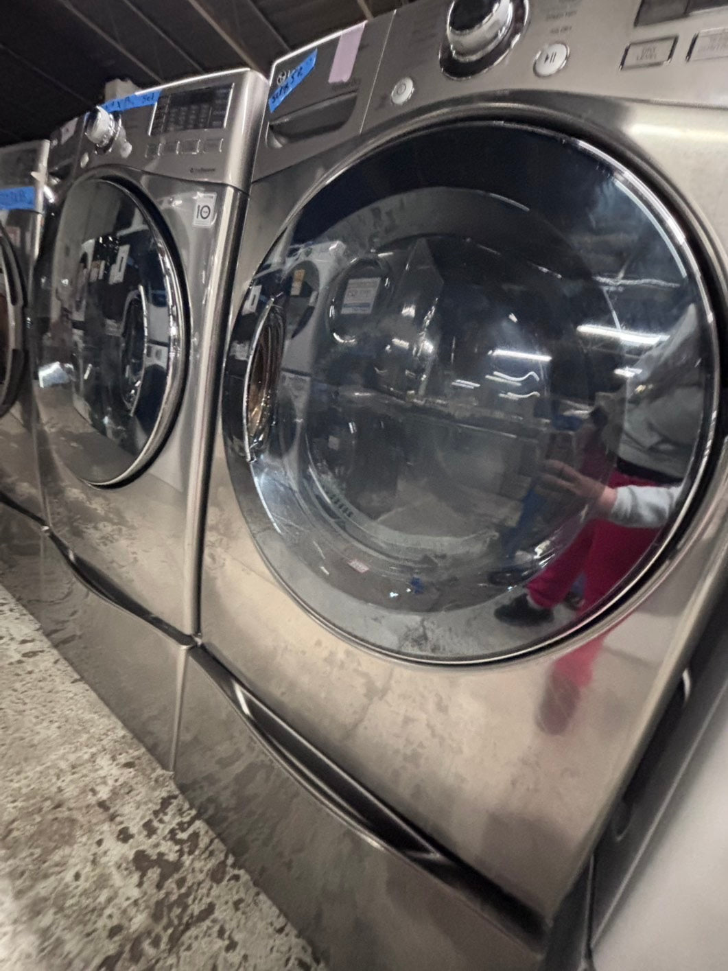 >used- refurbished LG front load washer & dryer set electric 220v large capacity with pedestals in stainless steel 27” #ELY3X45B
