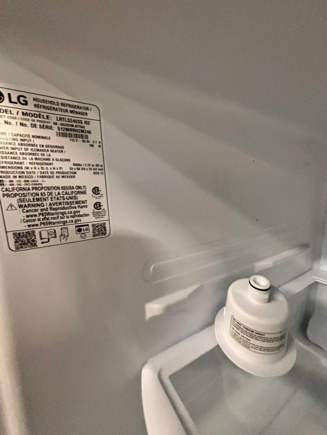 >new open box costumer return scratch & debt LG 33” Top freezer fridge, stainless #RLCF3C2B