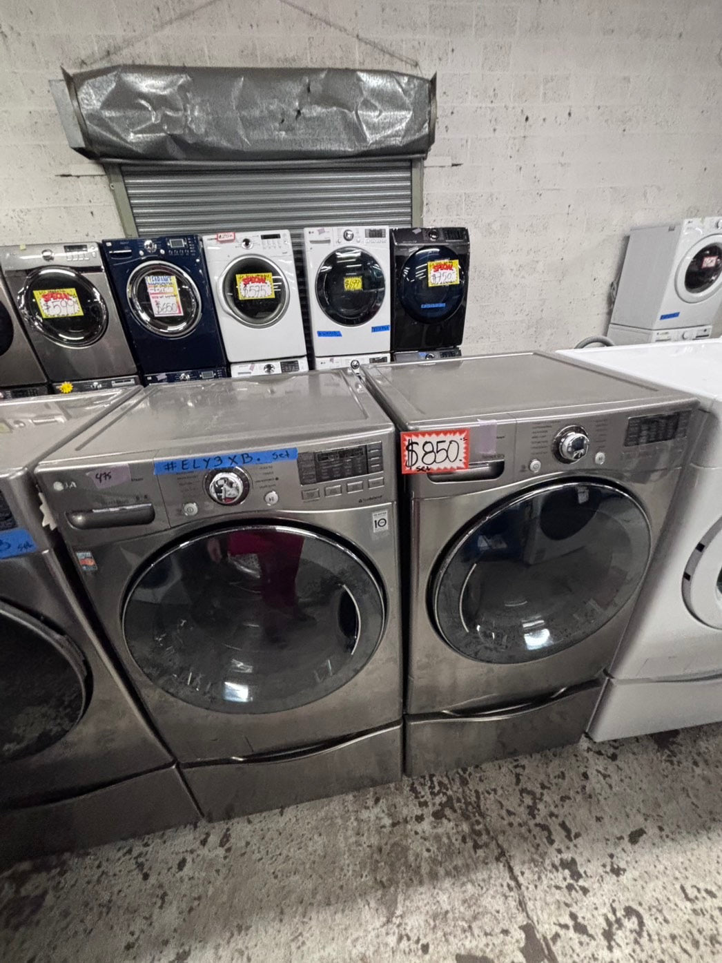 >used- refurbished LG front load washer & dryer set electric 220v large capacity with pedestals in stainless steel 27” #ELY3X45B