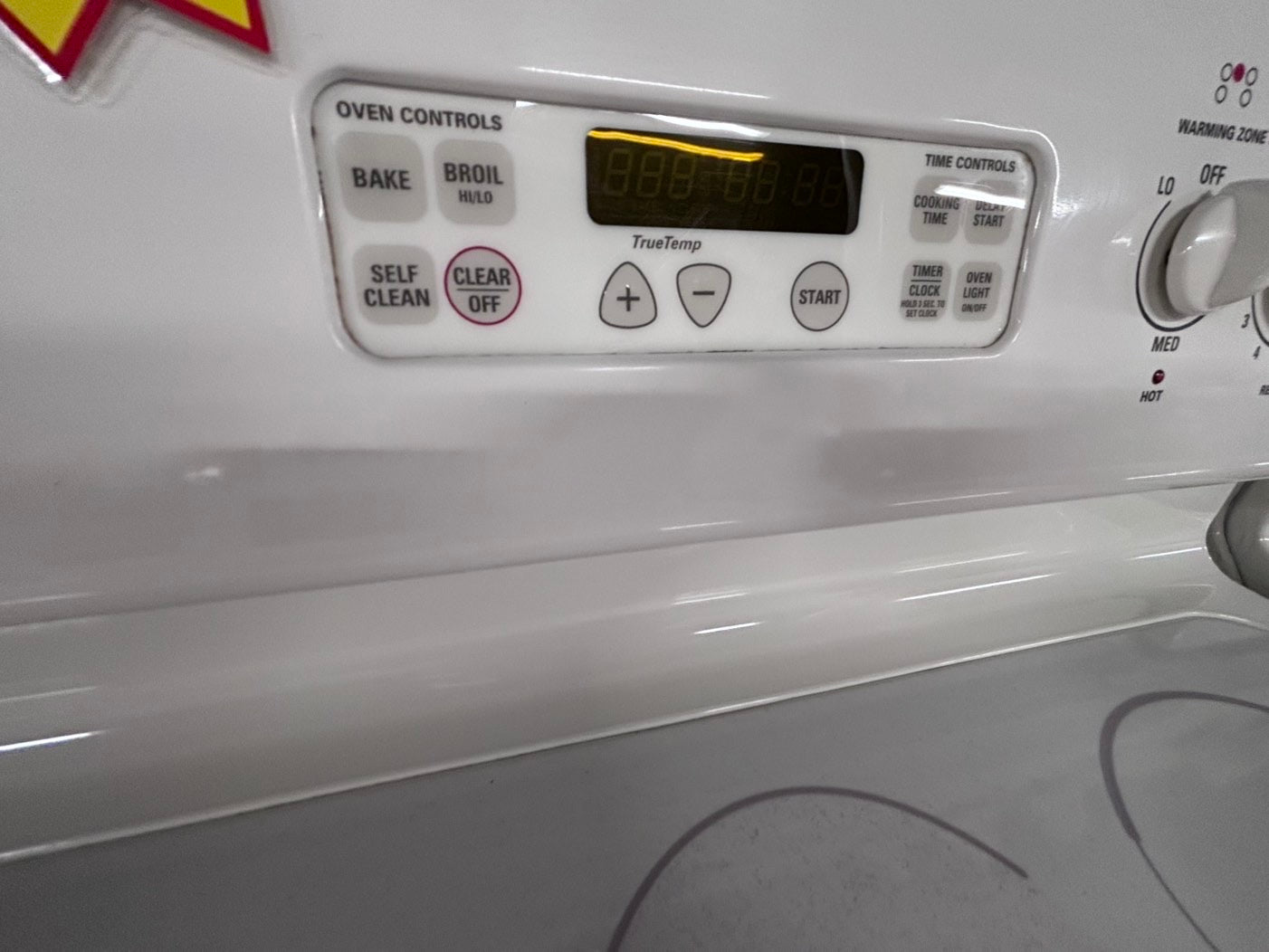 >GE Glass Top electric stove off white bake broil 4 burner warn zone Refurbished#ELR5TB