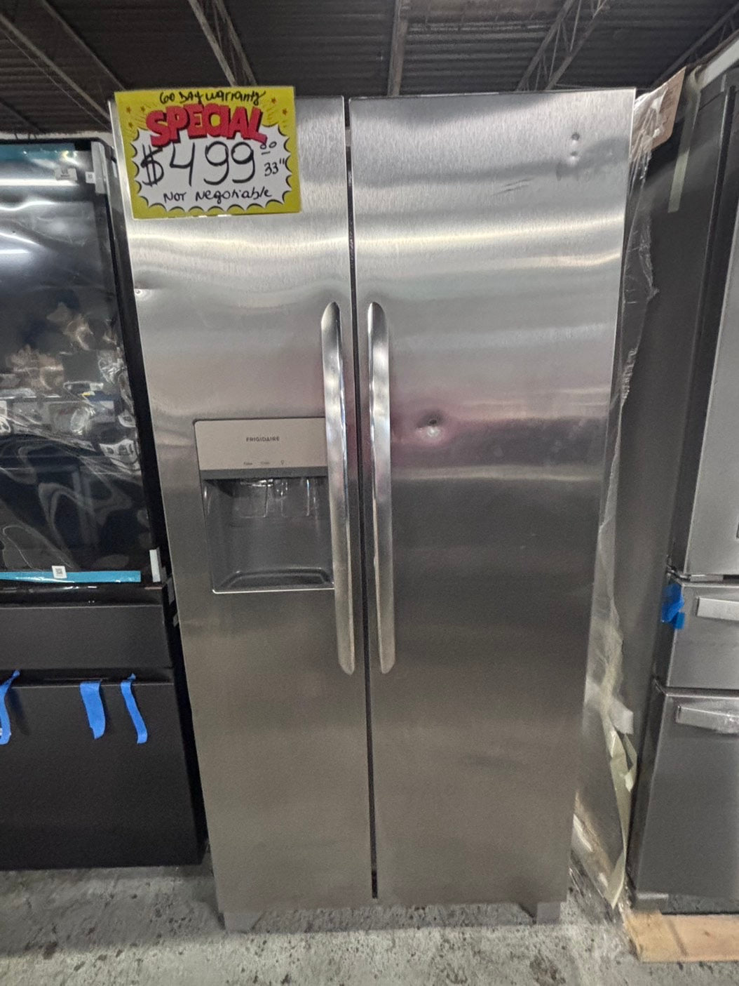 >used-refurbished Frigidaire 33” Side by Side Refrigerator stainless steel w/ice water dispenser  - #RFUR33LB