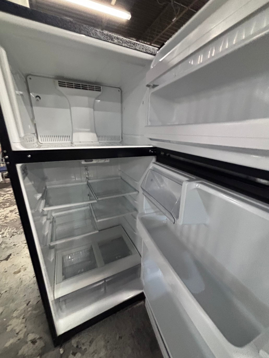 >*28” x 67”H GE  top freezer fridge black   used-refurbished #FGTR67WB