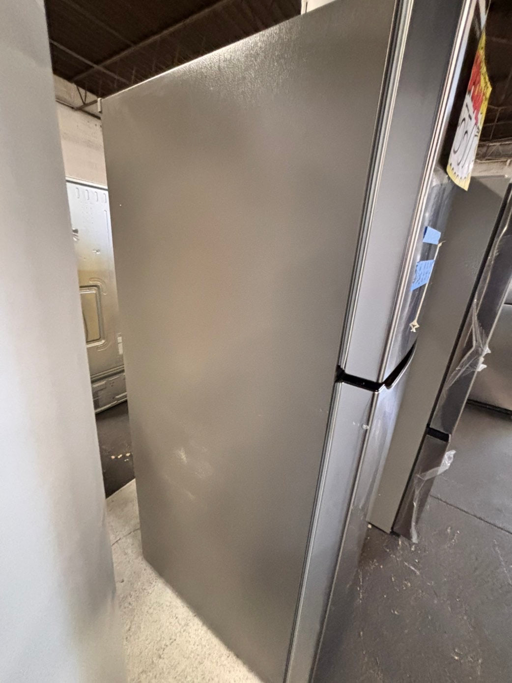 >new open box costumer return scratch & debt LG 33” Top freezer fridge, stainless #RLCF3C2B