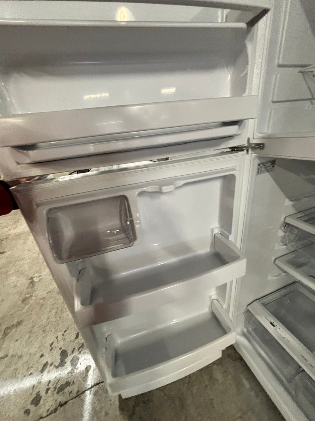 * GE used like new-top freezer refrigerator in white no ice maker 28" #RF1139FB