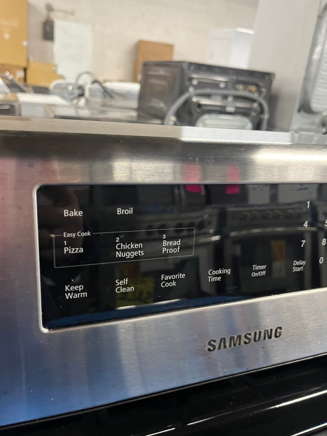 =Samsung  gas stove 5 burner keep warm self clean bake broil i/lo in black & silver -used-Refurbished 30” #GTTA19B