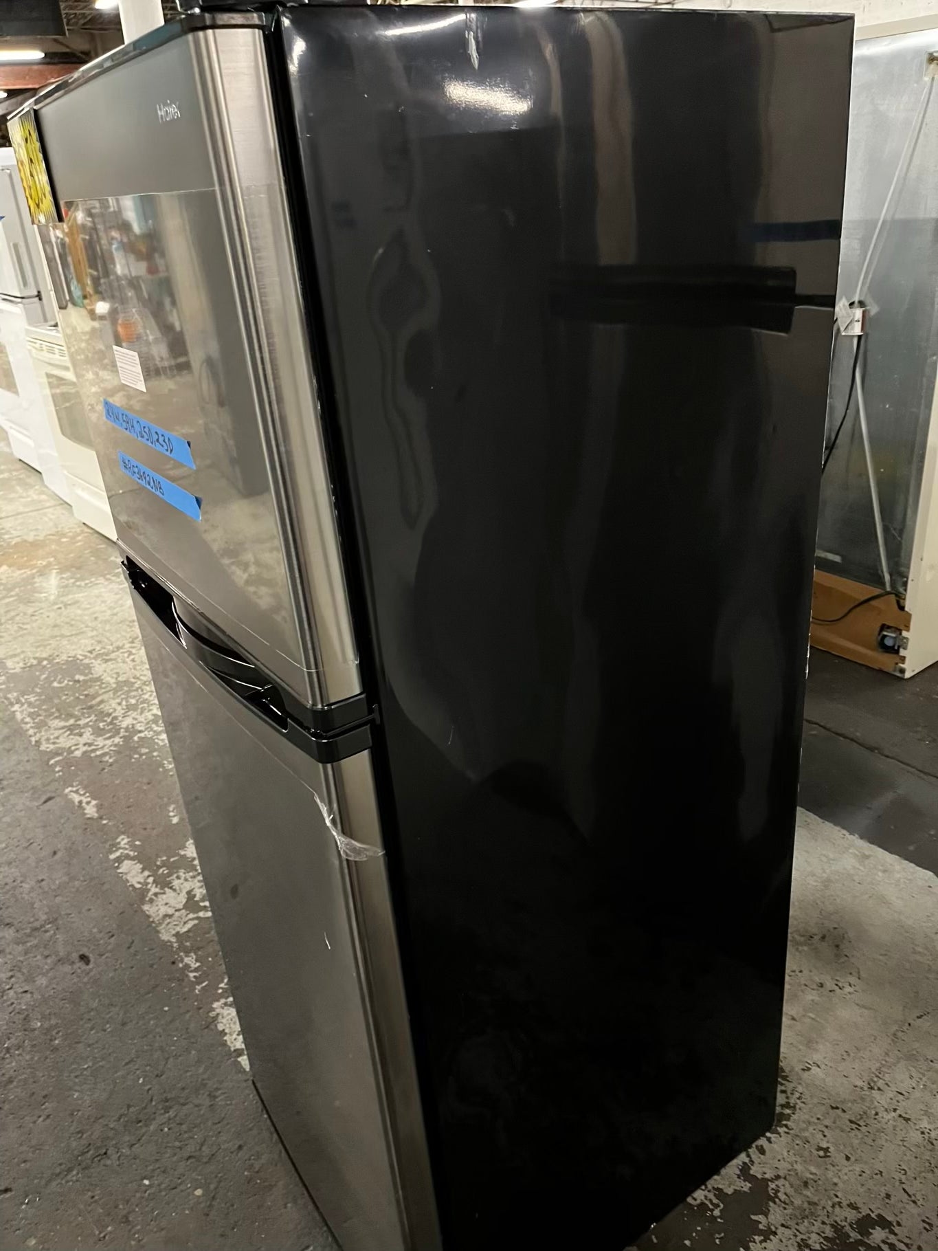 * Used | Refurbished Haier top freezer refrigerator 24" #RF3692NB
