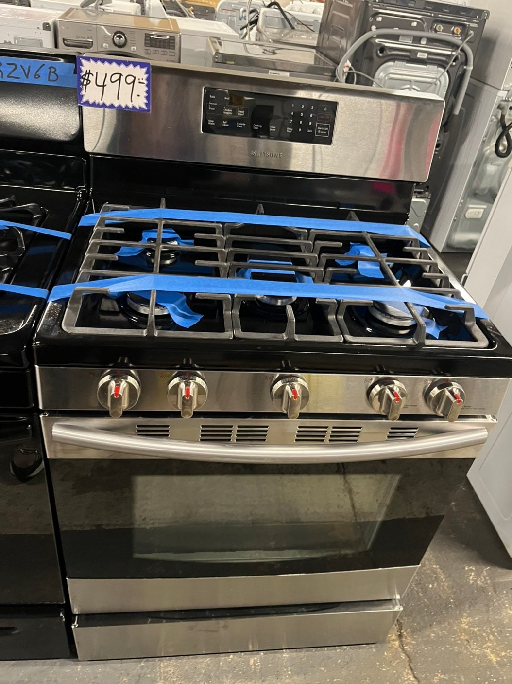 =Samsung  gas stove 5 burner keep warm self clean bake broil i/lo in black & silver -used-Refurbished 30” #GTTA19B