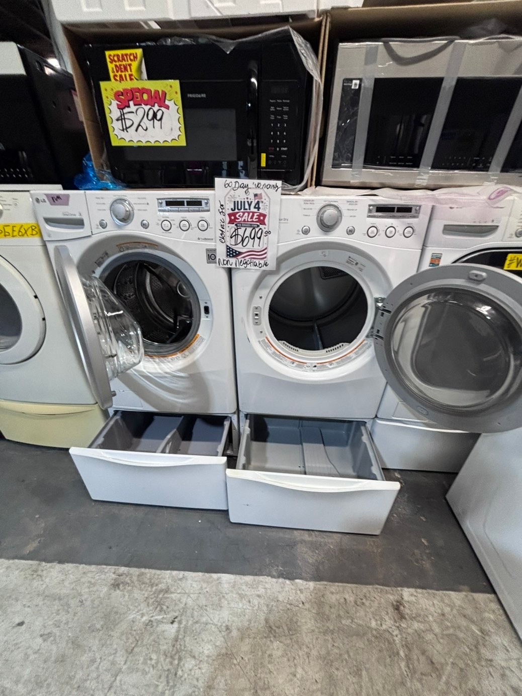 >*used- refurbished LG front load washer & dryer set  electric 220v large  capacity with pedestals in red color 27” #SFL55V7B