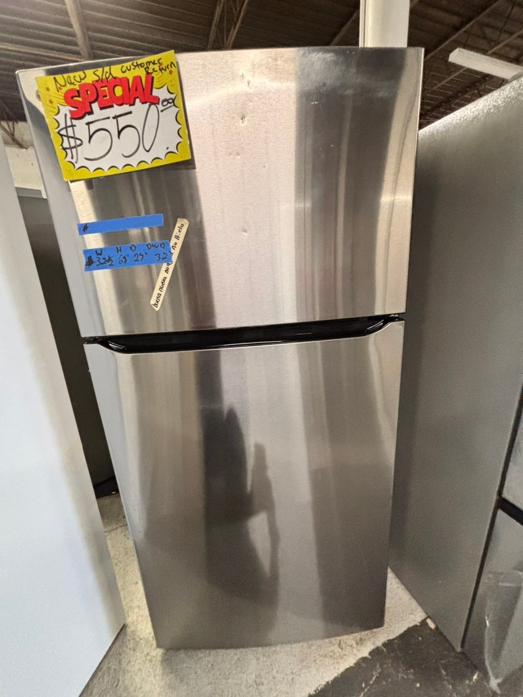 >new open box costumer return scratch & debt LG 33” Top freezer fridge, stainless #RLCF3C2B