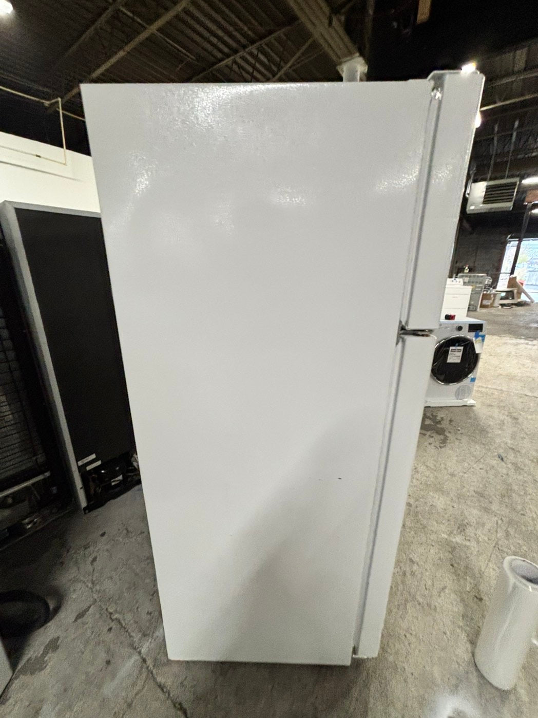 * GE used like new-top freezer refrigerator in white no ice maker 28" #RF1139FB