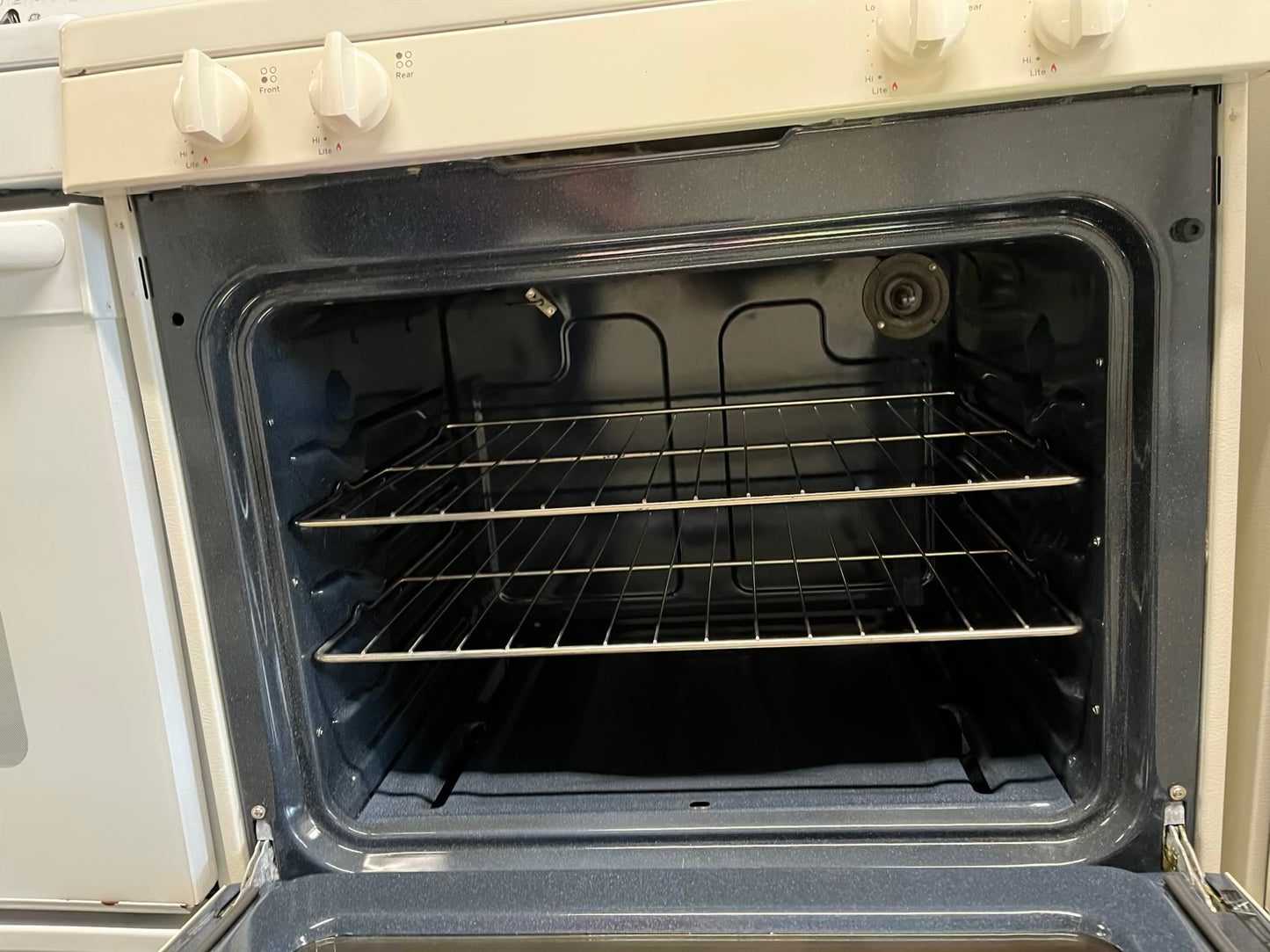 GE Gas range 4 burner bake broil hi/lo in off white Refurbished 30" #GR215WB