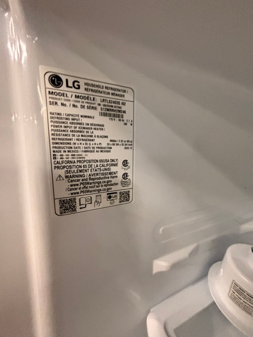 >new open box costumer return scratch & debt LG 33” Top freezer fridge, stainless #RLCF3C2B