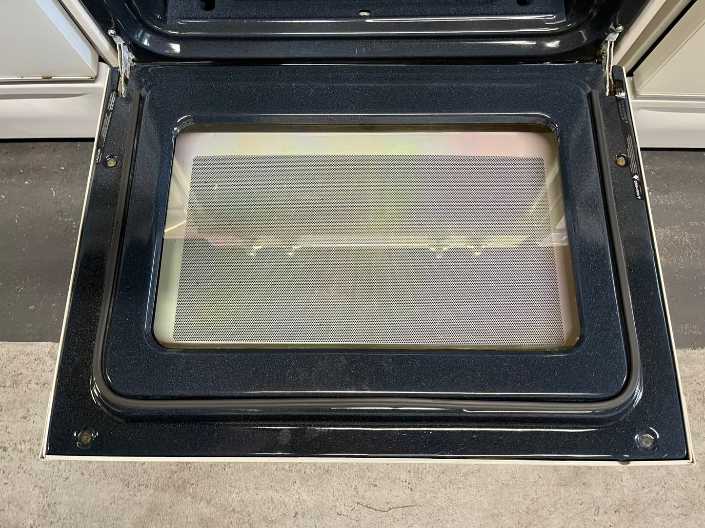 GE Gas range 4 burner bake broil hi/lo in off white Refurbished 30" #GR215WB