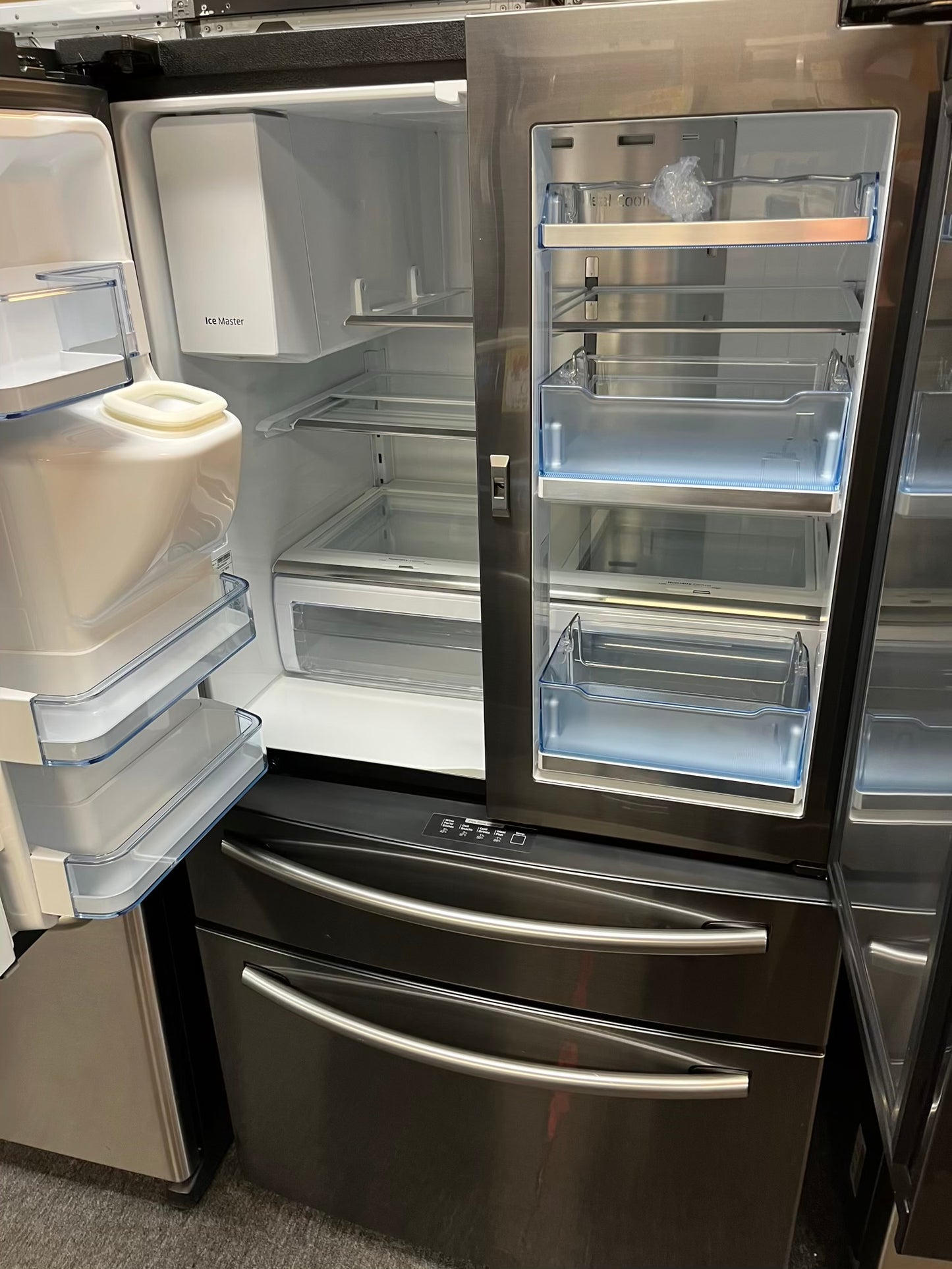 Samsung Four door refrigerator Showcase Slate stainless steel w/ice water dispenser 36" Refurbished #RF736EB