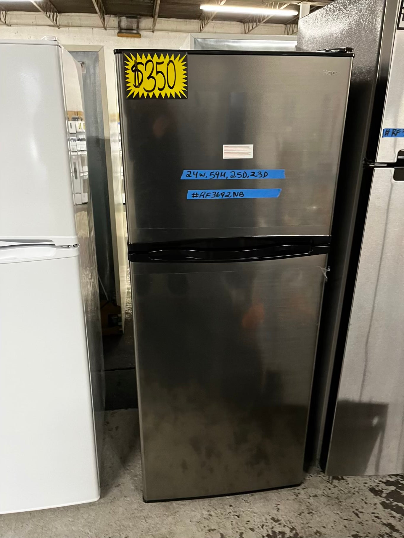 * Used | Refurbished Haier top freezer refrigerator 24" #RF3692NB