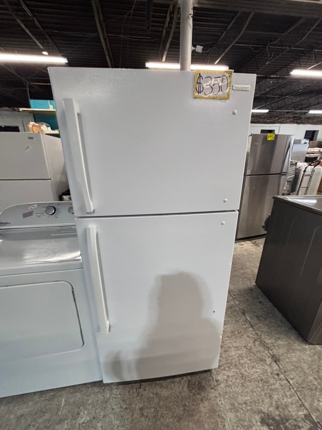 >*insignia 30”x 66”heigth x 29depth 18cu.ft -top freezer refrigerator white  color              -used refurbished 30” #TFUI33B