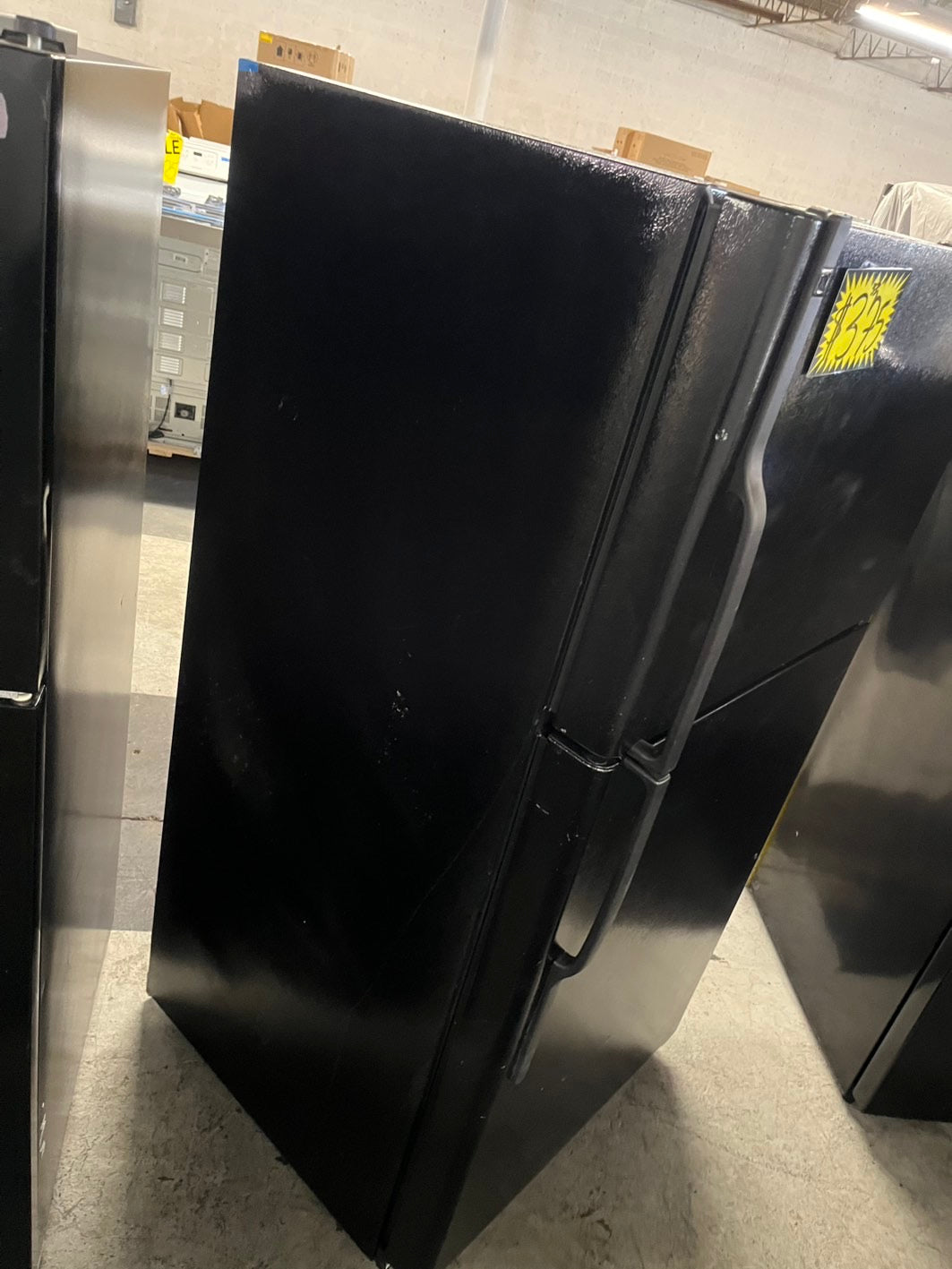 = Ge 33” Top freezer fridge  black refurbished #RFTB67B