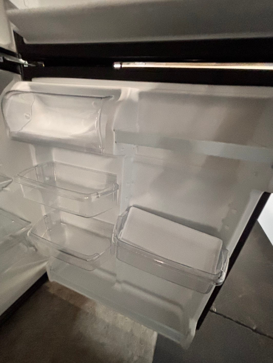 >whirlpool 33” Top freezer fridge  ,black used-refurbished #RFTT1B