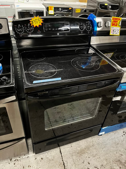 • GE glass top electric range 220v 4 burner Refurbished in black bake Broil hi/lo self clean  30" #ER3232AB