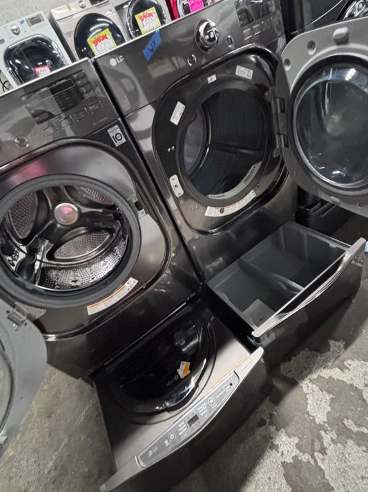 >used- refurbished LG front load double washer & dryer set electric 220v large capacity with small washer on the pedestals in dark stainless steel 27” #ELPV7B