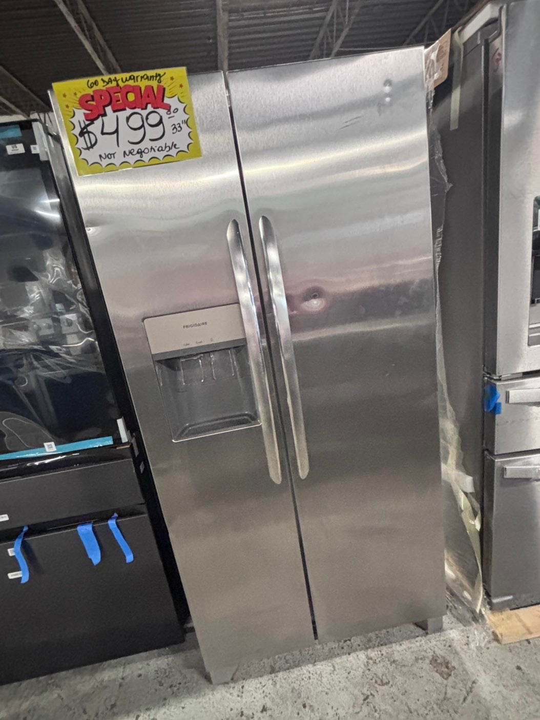 >used-refurbished Frigidaire 33” Side by Side Refrigerator stainless steel w/ice water dispenser  - #RFUR33LB
