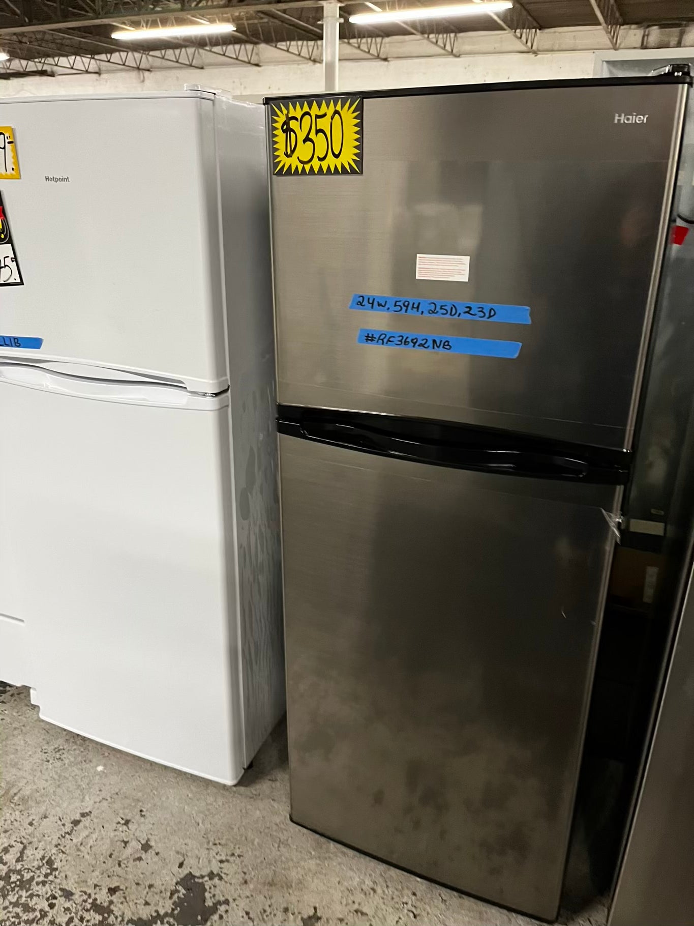 * Used | Refurbished Haier top freezer refrigerator 24" #RF3692NB