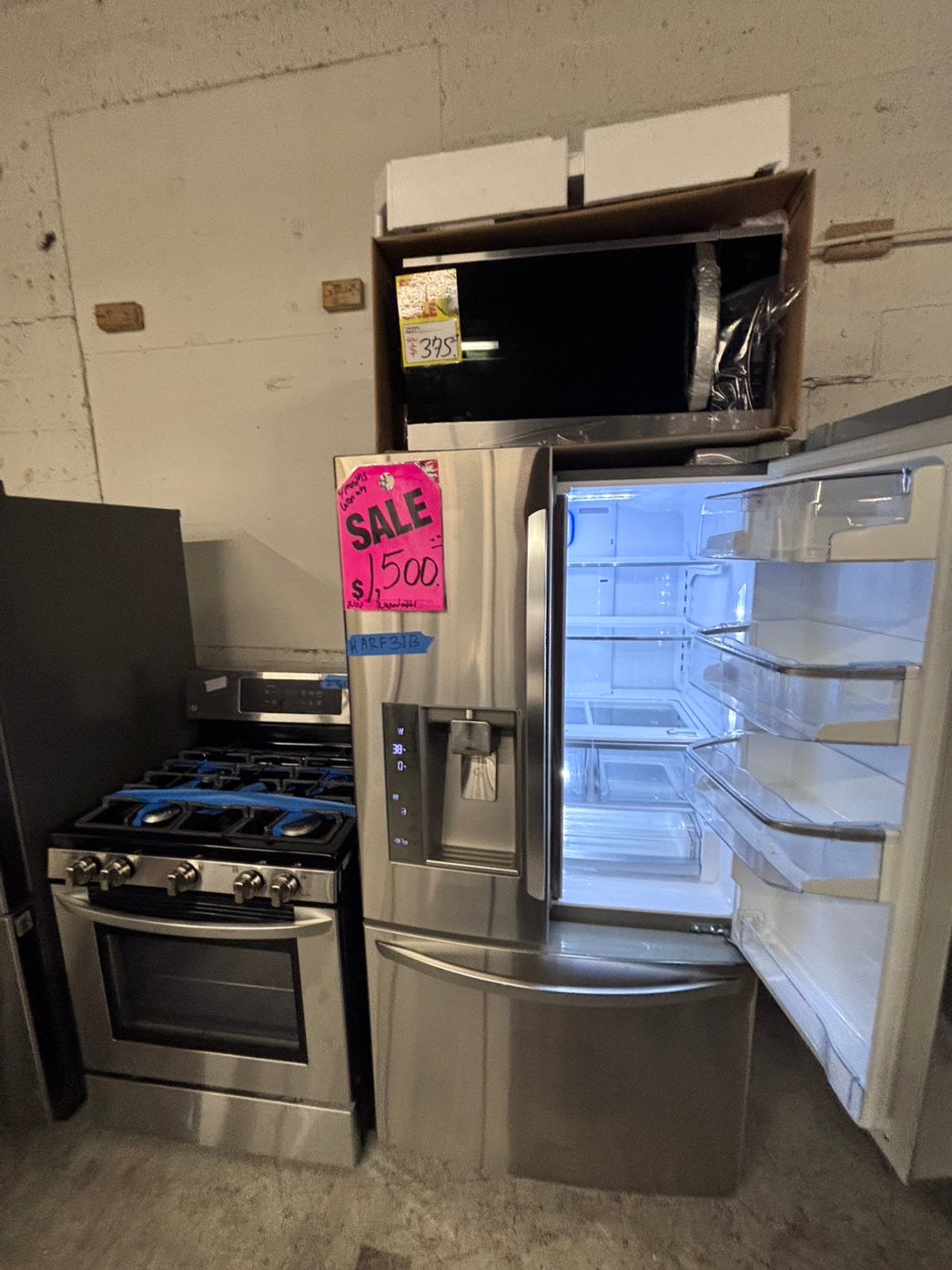 >special 3pc. Combo =LG French door Refrigerator counter depth  w/ ice water dispenser 36",gas stove 5 burners & new the range microwave all same brand  #ARF31B3PC