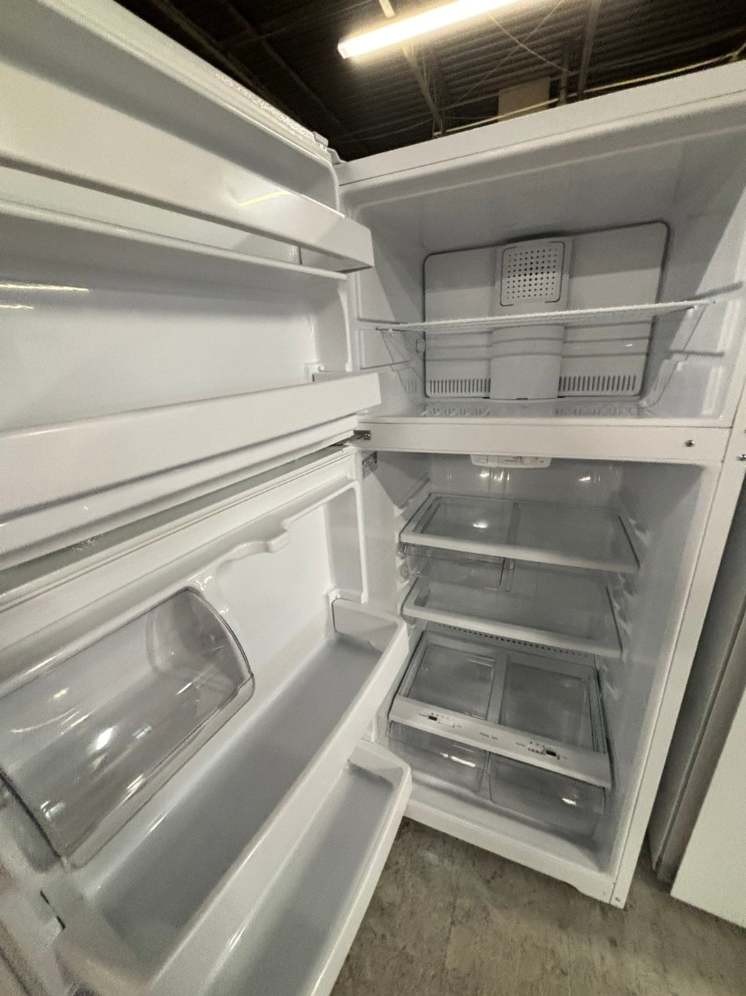 * GE used like new-top freezer refrigerator in white no ice maker 28" #RF1139FB