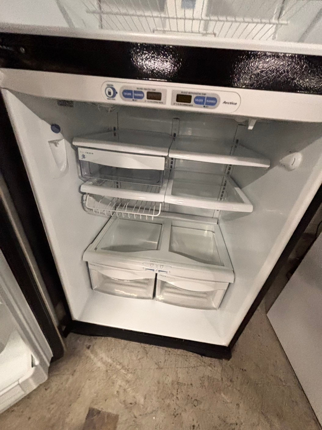 >GE  33” Top freezer fridge   ,stainless steel. used-refurbished #RG41T2B