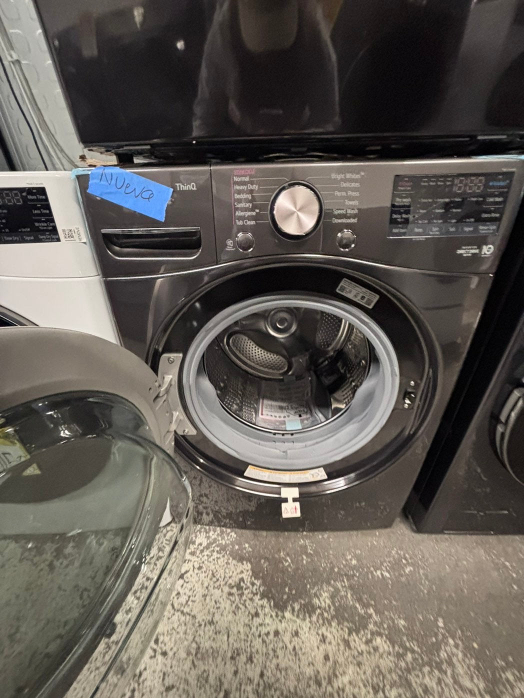 >>LG Open Box 📦 Scratch & Dent 4.5 cu. ft. Ultra Large Capacity Front Load Washer 
 & 7.4 cu. ft. Large Capacity Front Load Electric Dryer - black steel  Set / stock number #WD4001CB