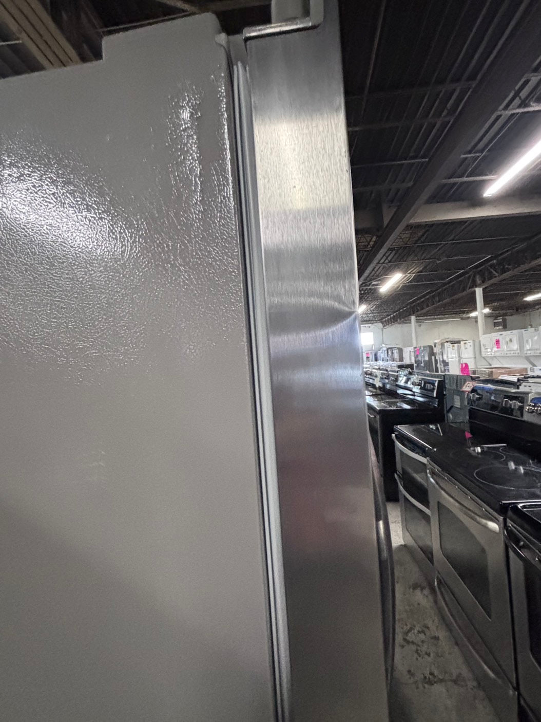 >used-refurbished Frigidaire 33” Side by Side Refrigerator stainless steel w/ice water dispenser  - #RFUR33LB