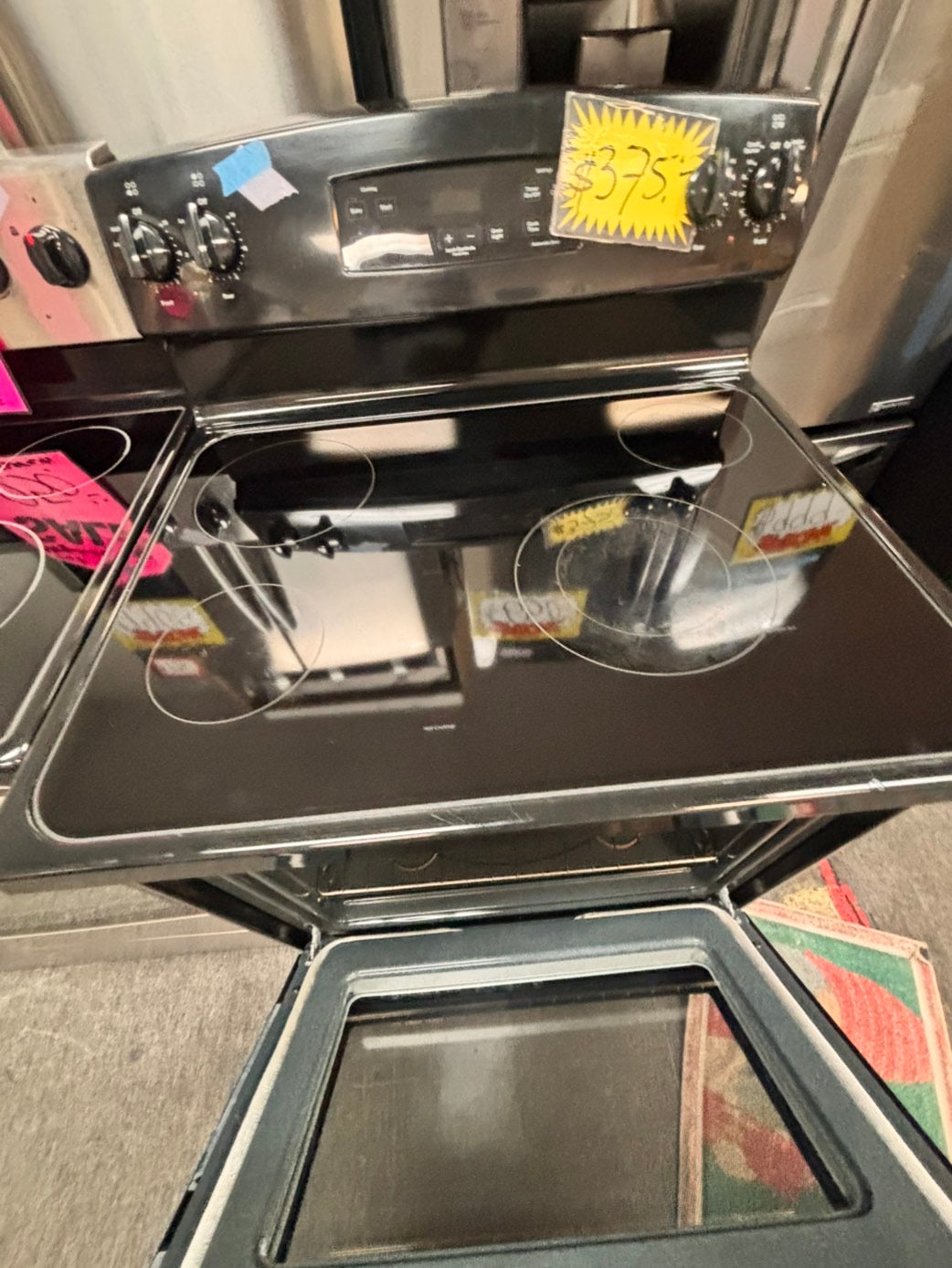 >GE Glass Top electric stove black bake broil 4 burner Self clean 30” black Refurbished #BBW96B